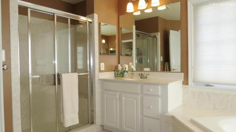 Master Bathroom has dual vanities, soaking tub and spearate shower--10204 Broadsword